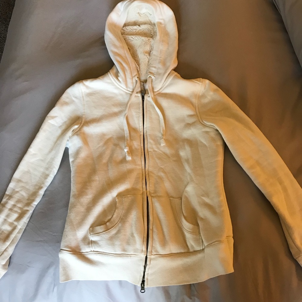Zip up jacket with faux fur inside.